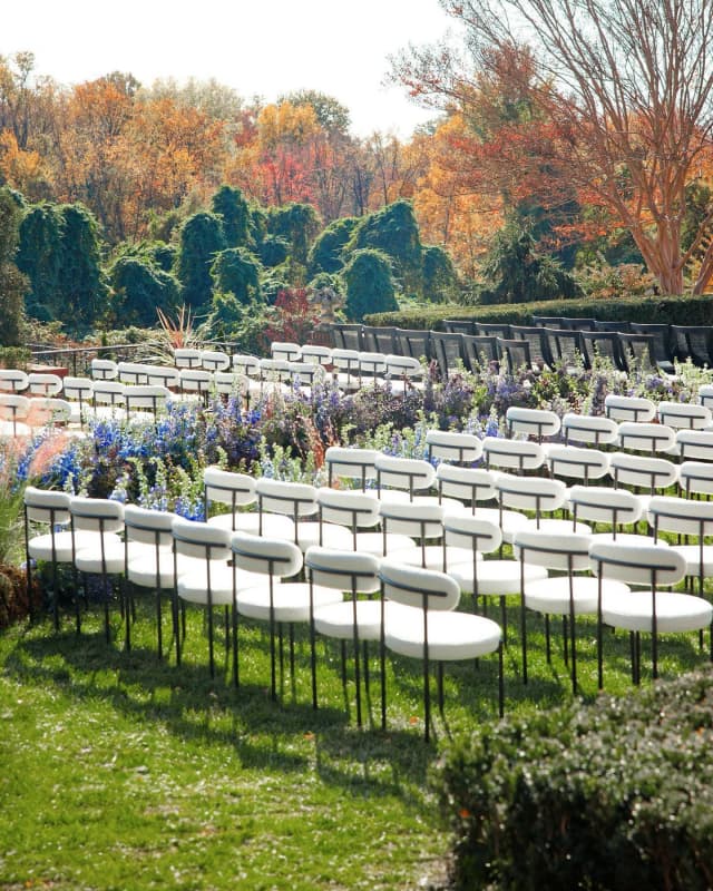 White boucle chairs at a wedding White boucle chairs at a wedding